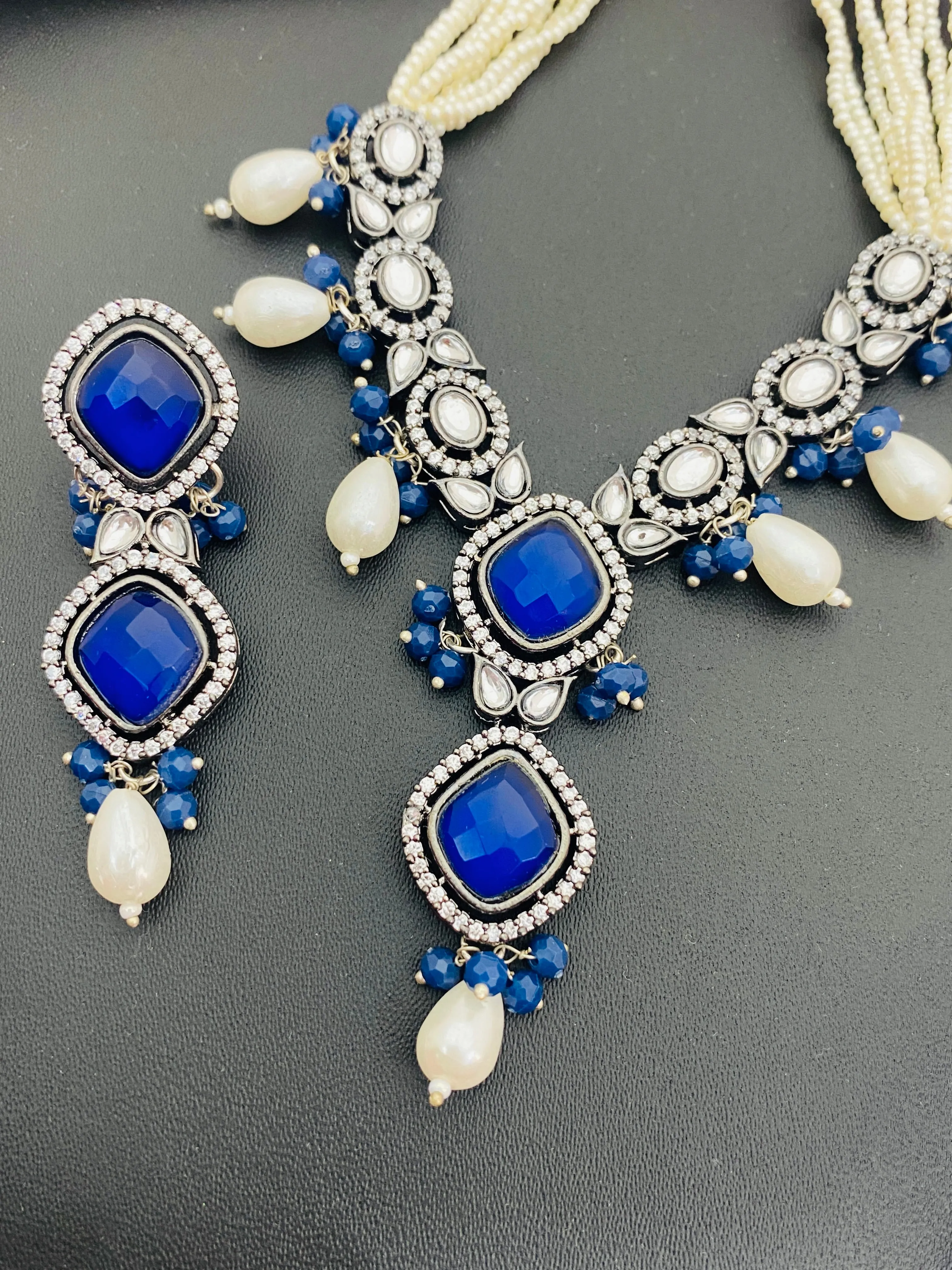 Beautiful Blue Stone Studded Silver Toned Oxidized Pearl Necklace Set With Matching Earrings