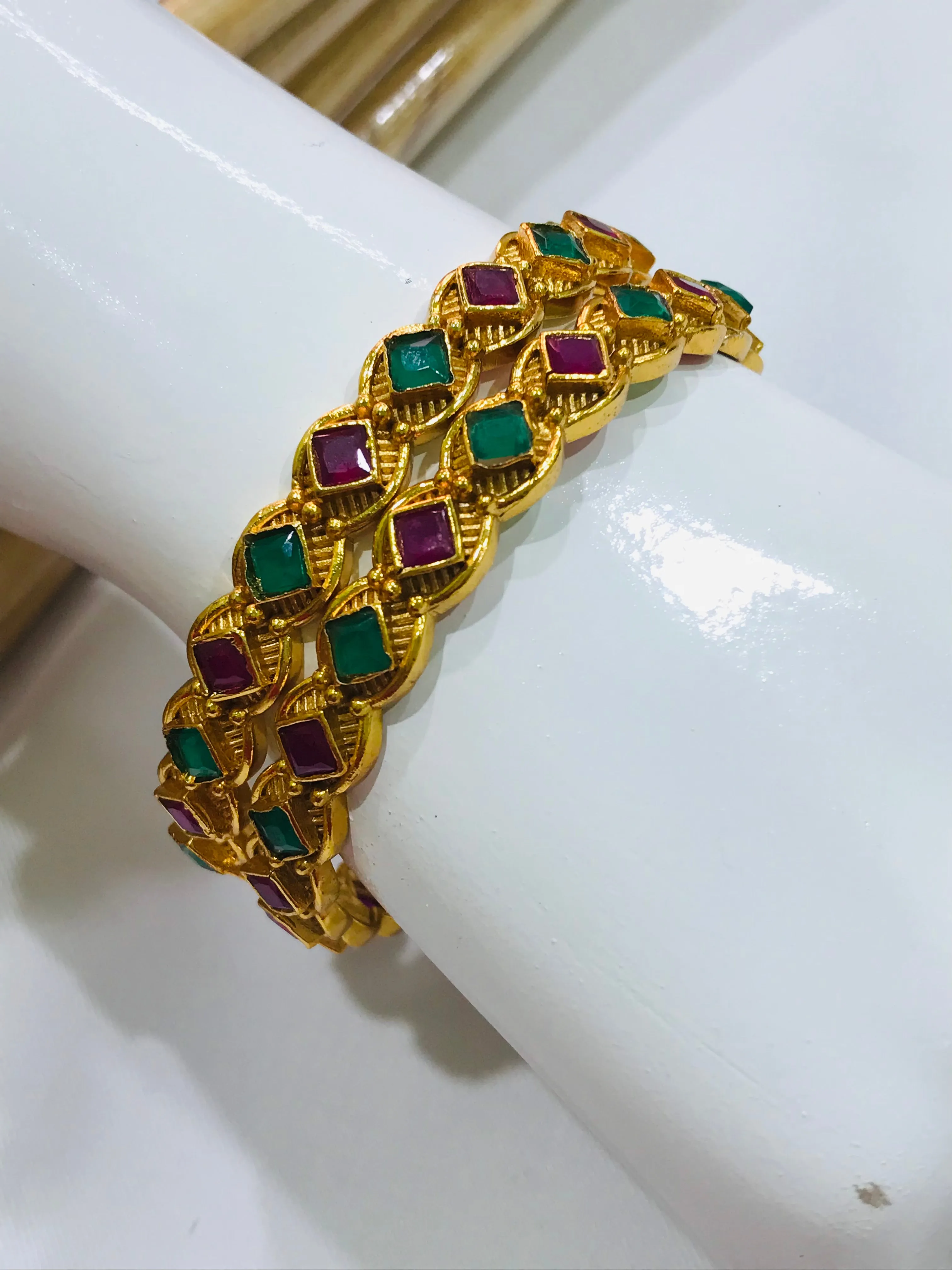 Beautiful Matte Finished Antique Gold Bangle Set With Emerald And Ruby Stones