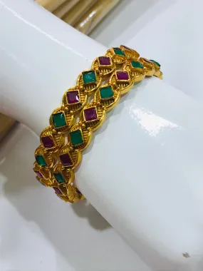 Beautiful Matte Finished Antique Gold Bangle Set With Emerald And Ruby Stones