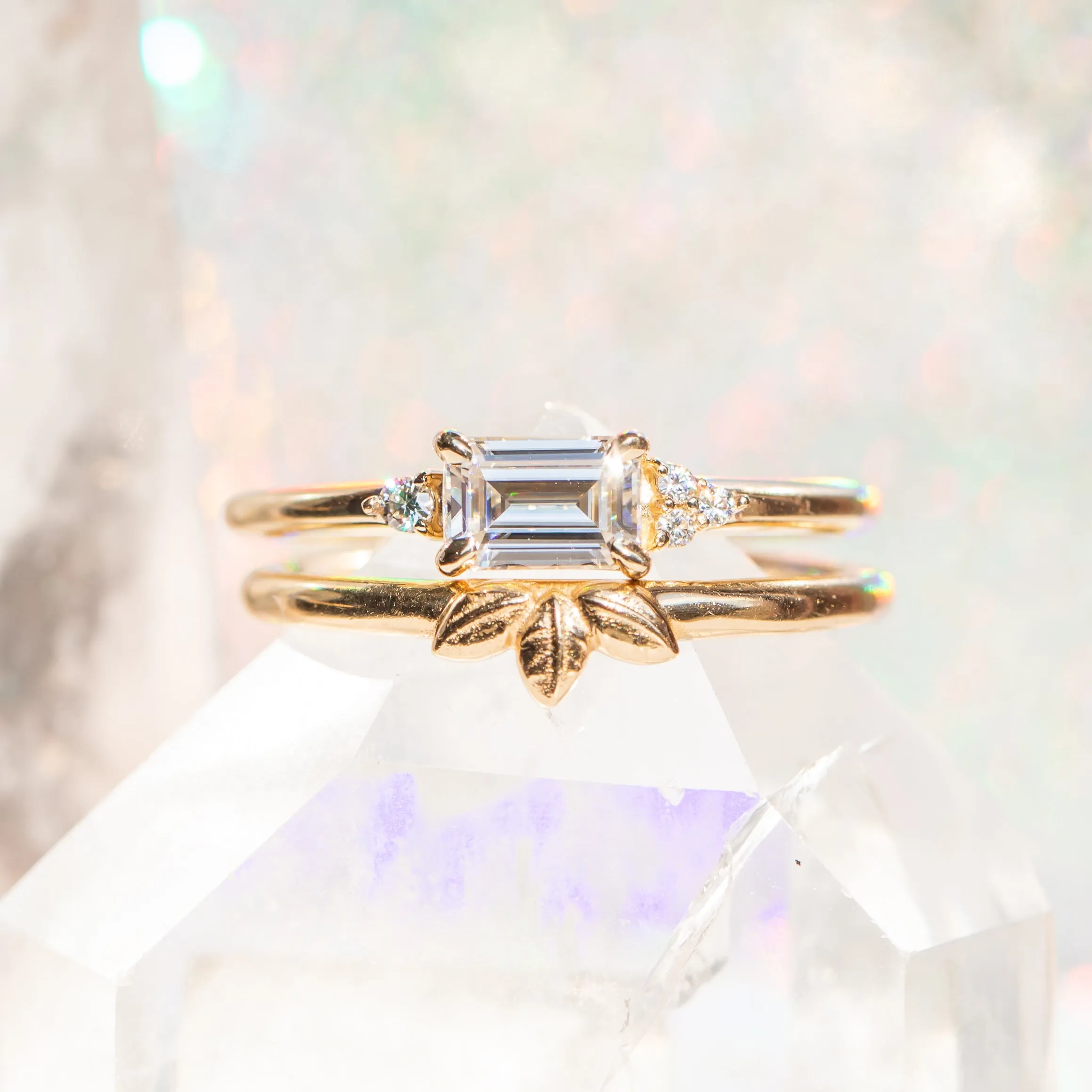 East-West Emerald cut Moissanite Asymmetrical Ring in 14k Yellow Gold