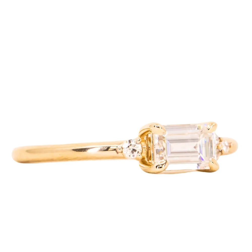 East-West Emerald cut Moissanite Asymmetrical Ring in 14k Yellow Gold