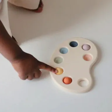 Mushie Paint Palette Press Toy