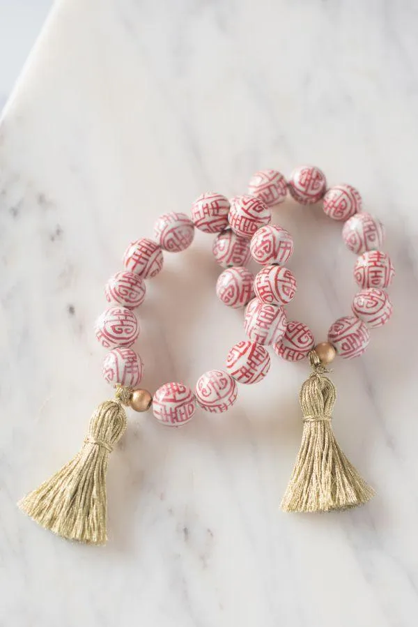 The Barre Tassel Bracelet in Red