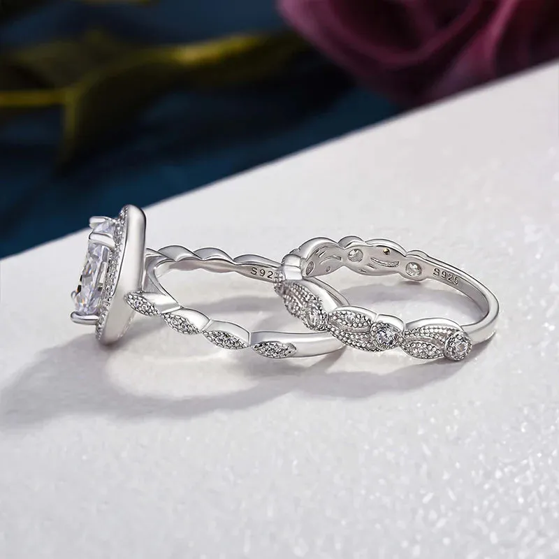 Unique Design Leaf & Vine Halo Oval Cut Bridal Set in Sterling Silver